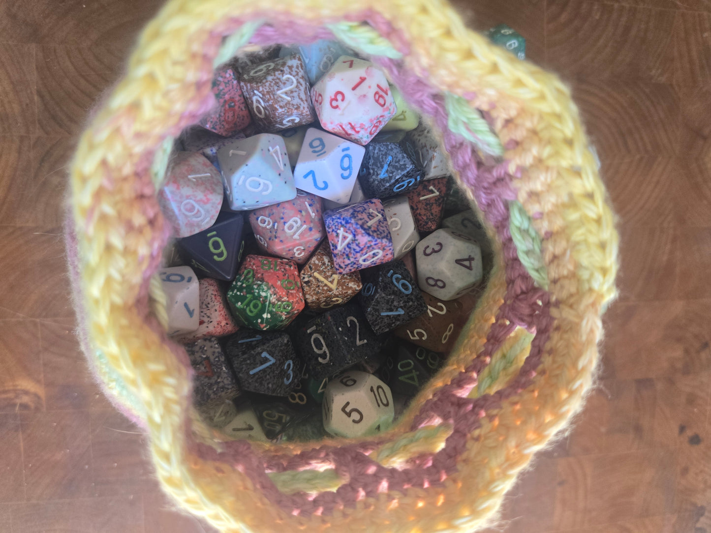 Really bloody large orange/green/pink dice bag.