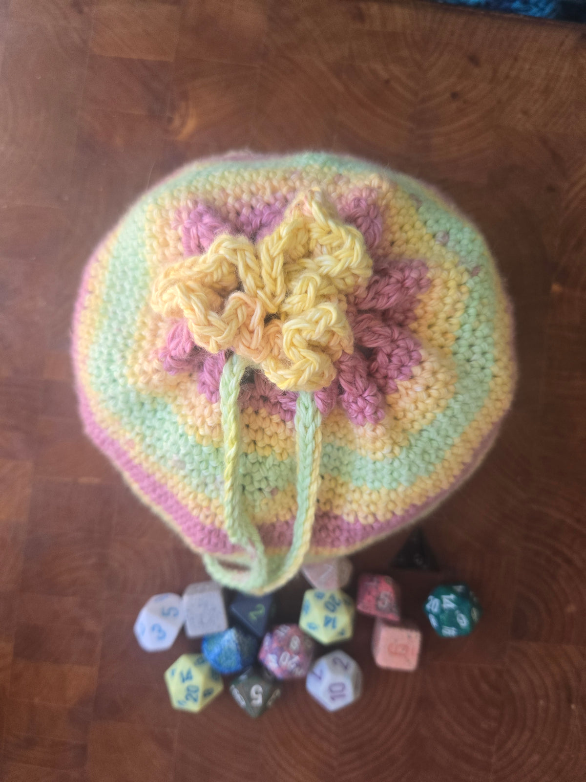 Really bloody large orange/green/pink dice bag.